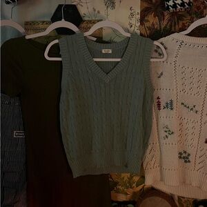small/medium teal knitted sweater vest